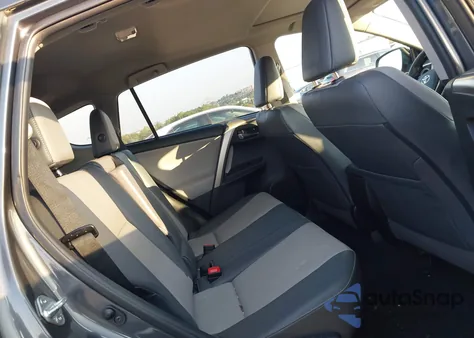 2014 Toyota Rav4 Limited z USA, uszkodzony, nr VIN 2T3DFREVXEW176842